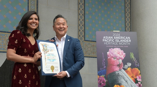 Councilmember John Lee honoring Los Angeles-based national reporter for ABC News, Zohreen Shah.